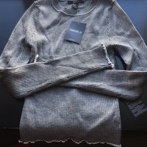 grey long sleeve with white edges